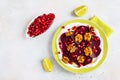 Dietary vegetarian salad of roasted beets with pomegranate seeds, walnuts caramelized in honey and natural yoghurt. Royalty Free Stock Photo