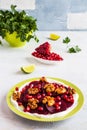 Dietary vegetarian salad of roasted beets with pomegranate seeds, walnuts caramelized in honey and natural yoghurt. Royalty Free Stock Photo