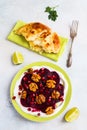 Dietary vegetarian salad of roasted beets with pomegranate seeds, walnuts caramelized in honey and natural yoghurt. Royalty Free Stock Photo