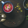 Dieting beetroot soup with mint, pistachio and seeds, copy space Royalty Free Stock Photo