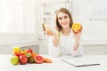 Dietitian nutritionist with bun and orange Royalty Free Stock Photo