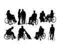 Handicapped and wheelchair Silhouettes Royalty Free Stock Photo