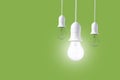 Difference light bulb on green background. concept of new ideas