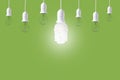 Difference light bulb on green background. concept of new ideas