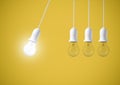 Difference light bulb on yellow background. concept of new ideas