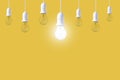 Difference light bulb on yellow background. concept of new ideas