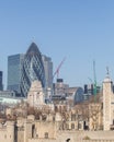 Saint Mary Axe and Tower of London .