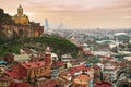 Different angle view on famous Tbilisi baths District, Abanotubani with church inside Narikala fortress and mosque in old town.