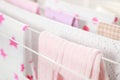 Different apparel drying on clothes airer Royalty Free Stock Photo