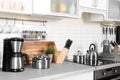 Different appliances, clean dishes and utensils Royalty Free Stock Photo