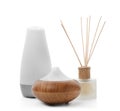 Different aroma oil diffusers on white background.