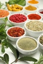 Different aromatic spices and herbs on white background, closeup Royalty Free Stock Photo