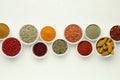 Different aromatic spices and herbs on white background, flat lay Royalty Free Stock Photo