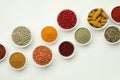 Different aromatic spices and herbs on white background, flat lay Royalty Free Stock Photo