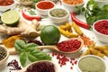 Different aromatic spices, lime and herbs on white background, closeup Royalty Free Stock Photo