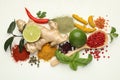 Different aromatic spices, lime and herbs on white background, flat lay Royalty Free Stock Photo