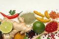 Different aromatic spices, lime and herbs on white background, flat lay Royalty Free Stock Photo