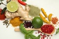 Different aromatic spices, lime and herbs on white background, flat lay Royalty Free Stock Photo