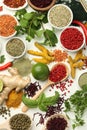 Different aromatic spices, lime and herbs on white background, flat lay Royalty Free Stock Photo