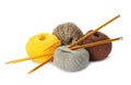 Different balls of woolen knitting yarns and needles on white background Royalty Free Stock Photo