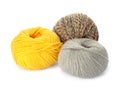 Different balls of woolen knitting yarns on white background Royalty Free Stock Photo
