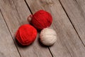 Different balls of yarn on rastic background Royalty Free Stock Photo