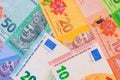 Different banknotes from Malaysia, Euro cash banknote in mixed arrangement on flat surface Royalty Free Stock Photo
