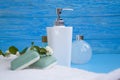 Different bathroom decoration lotion natural    spa wash accessories on a colored background Royalty Free Stock Photo