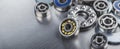 Different bearings on a metal background. Part of mechanism Royalty Free Stock Photo