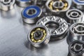 Different bearings on a metal background. Part of mechanism Royalty Free Stock Photo