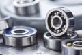 Different bearings on a metal background. Part of mechanism Royalty Free Stock Photo