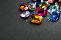 Different beautiful bright gemstones on background Royalty Free Stock Photo