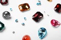 Different beautiful bright gemstones on white Royalty Free Stock Photo