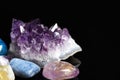 Different beautiful gemstones, closeup. Space for text Royalty Free Stock Photo