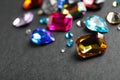 Different beautiful gemstones on background. Space for text Royalty Free Stock Photo