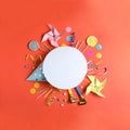 Different birthday party items and blank card on coral background, flat lay. Space for