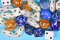 Different blue, white and golden roleplaying RPG dice Royalty Free Stock Photo