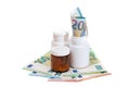 Different Bottles with Pills, Capsules and Medicines on the Euro Banknotes Royalty Free Stock Photo