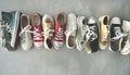 Different canvas shoes on background Royalty Free Stock Photo