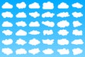 36 different cartoon cloud icons on blue gradient background. Royalty Free Stock Photo