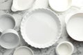 Different casseroles on white marble table, flat lay Royalty Free Stock Photo