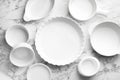 Different casseroles on white marble table, flat lay Royalty Free Stock Photo