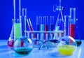 Different Chemistry lab set on a table over blue background Royalty Free Stock Photo