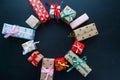 Different christmas gifts on a black background Royalty Free Stock Photo