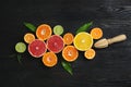 Different citrus fruits on wooden background Royalty Free Stock Photo