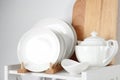 Different clean tableware on shelf Royalty Free Stock Photo