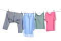 Different clothes drying on washing line against background Royalty Free Stock Photo