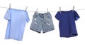 Different clothes drying on washing line against background Royalty Free Stock Photo