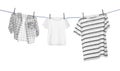 Different clothes drying on washing line against background Royalty Free Stock Photo