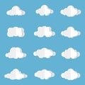 Different clouds on blue sky in origami design. Collection of white paper cut out cloud icons. Paper cloud. Weather symbols. Royalty Free Stock Photo